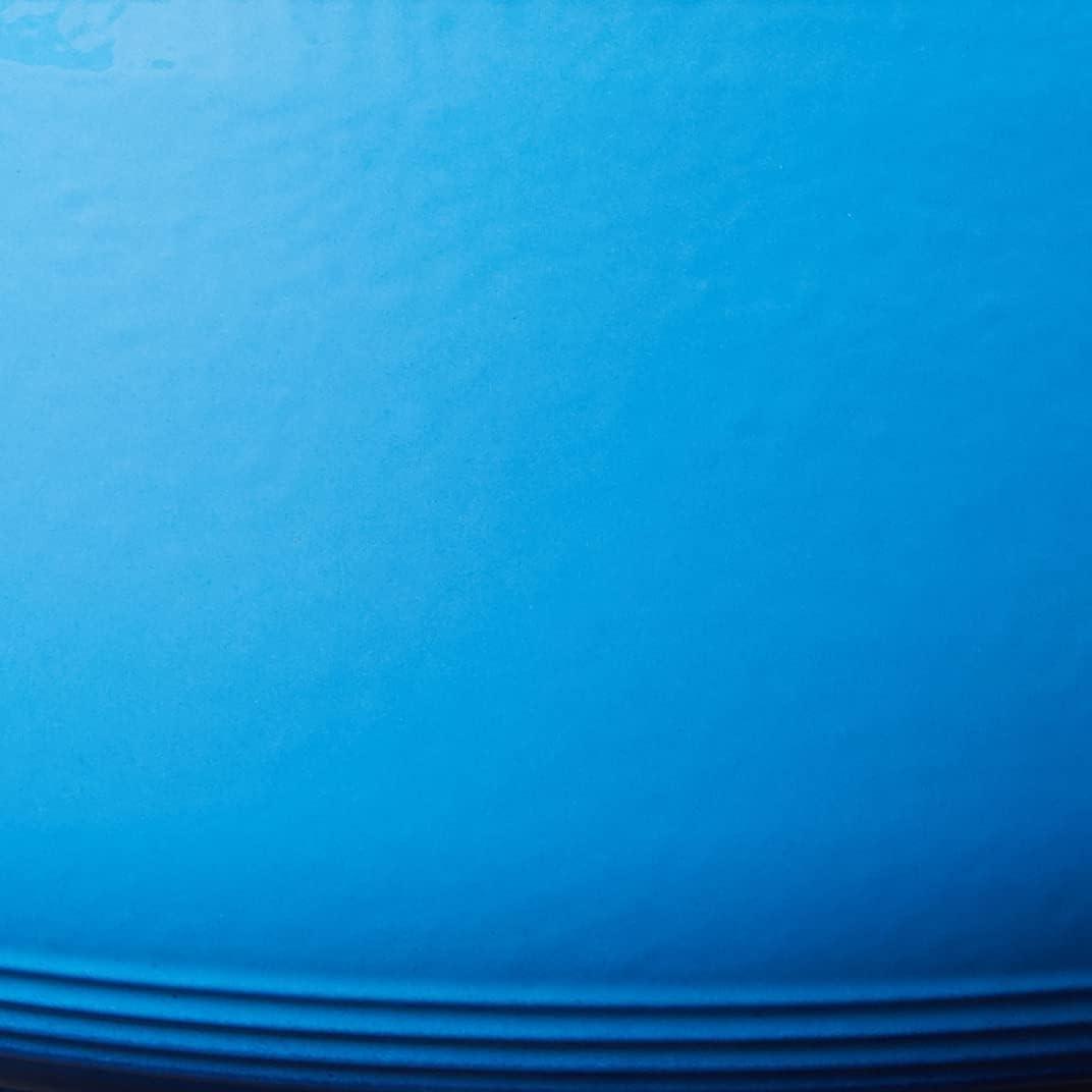 imageLodge 45 Quart Enameled Cast Iron Dutch Oven with Lid Dual Handles Oven Safe up to 500 F or on Stovetop Use to Marinate Cook Bake Refrigerate and Serve Island Spice RedCaribbean Blue