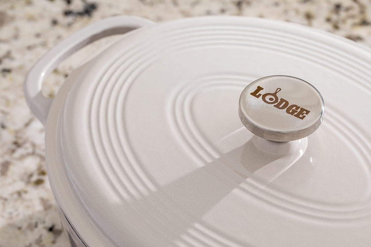 imageLodge 7 Quart Enameled Cast Iron Oval Dutch Oven with Lid Dual Handles Oven Safe up to 500 F or on Stovetop Use to Marinate Cook Bake Refrigerate and Serve Oyster WhiteOyster White