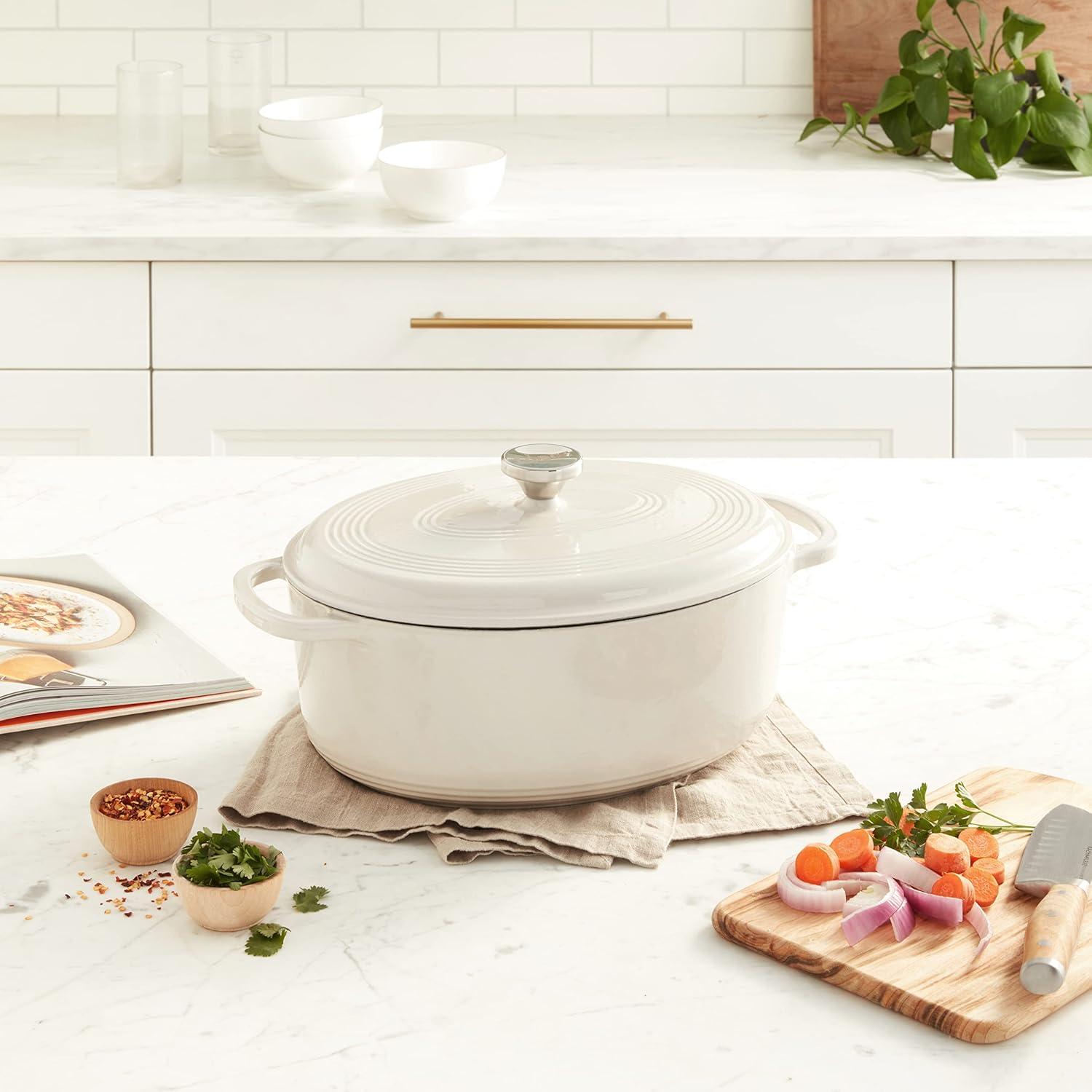 imageLodge 7 Quart Enameled Cast Iron Oval Dutch Oven with Lid Dual Handles Oven Safe up to 500 F or on Stovetop Use to Marinate Cook Bake Refrigerate and Serve Oyster WhiteOyster White
