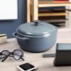 Lodge 3 Quart Enameled Cast Iron Dutch Oven with Lid – Dual Handles – Oven Safe up to 500° F or on Stovetop – Use to Marinate, Cook, Bake, Refrigerate and Serve – Caribbean Blue(Storm Blue)